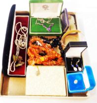 A card tray containing a quantity of jewellery items including amber shard bead necklace, 925 and