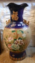 A large 20th Century Chinese porcelain vase of baluster form, with transfer printed and enamelled