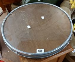A 45cm diameter vintage chrome plated framed 'Lazy Susan' with glass inset top