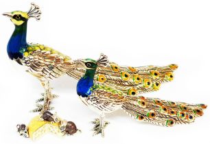 Two marked 925 peacock ornaments with part enamelled decoration - sold with an import marked