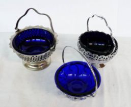 Three assorted silver plated sugar dishes with blue glass liners
