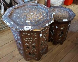 Two late Moorish occasional tables with inlaid decoration and pierced faceted bases - various