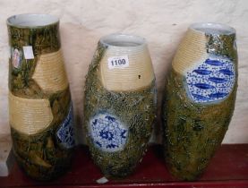 Three mid 20th Century Chinese porcelain vases each with hand painted and brickwork panels on a