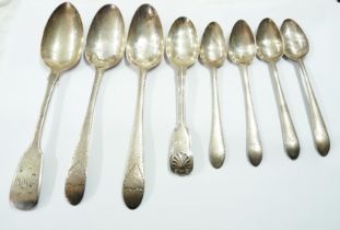 A bag containing antique English silver dessert and tablespoons - various designs and condition