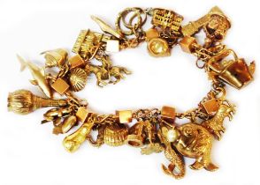 A vintage Egyptian rose metal cube-link bracelet, set with numerous 375 (9ct.) gold and yellow metal
