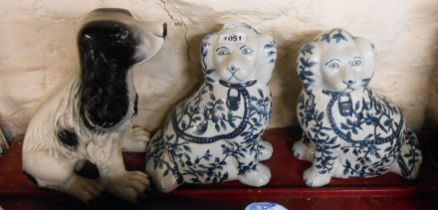 A pair of late 20th Century Staffordshire style dogs - sold with a plaster dog figurine