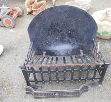An old cast iron fire basket