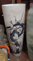 A large 20th Century Chinese porcelain vase of tapering cylindrical form, with hand painted enamel