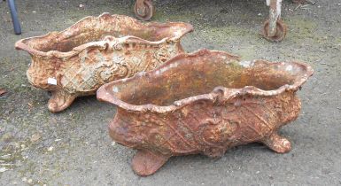 A pair of small antique French ornate cast iron planters