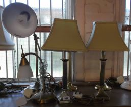 Six modern brass table lamps of various form