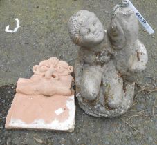 A fountain in the form of a child - sold with a gargoyle pattern planter