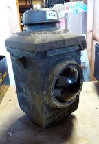 An old British Railways (Eastern Region) cast iron G72 railway lamp with red bull's-eye lenses