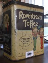 A Rowntrees Toffee advertising tin