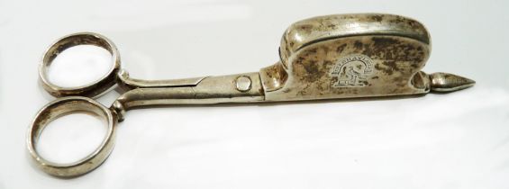 An early 18th Century Britannia silver candle snuffer by Joseph Bird bearing Acland family '