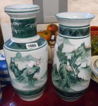 A 20th Century Chinese porcelain vase with hand painted landscape decoration in a green palette -