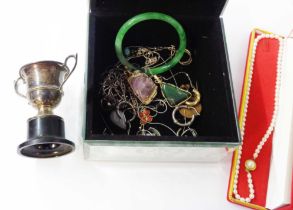 A mirror clad jewellery box containing white metal jewellery and other jewellery, jadeite bangle,