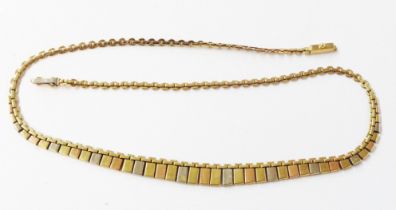 A vintage 375 (9ct.) three colour gold dentil-link necklace