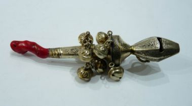 An 800 grade ornate baby's rattle with bells (one detached, but included) and red branch coral