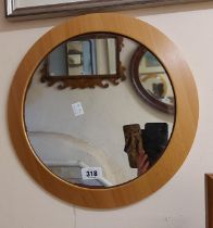 A modern small polished wood framed circular wall mirror - plate a/f