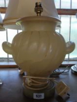 An old alabaster table lamp of urn form