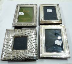 A small modern silver fronted photograph frame with crocodile skin effect finish - sold with another