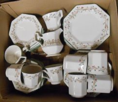 A box containing a quantity of Johnson Brothers tableware decorated in the 'Eternal Beau' pattern