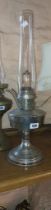 A vintage Aladdin Model No. 12 oil lamp with chrome base