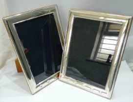 A pair of medium size modern silver fronted photograph frames by Carrs, with enlarged 2000