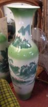 A very large 20th Century Chinese porcelain vase with hand painted decoration in green, depicting