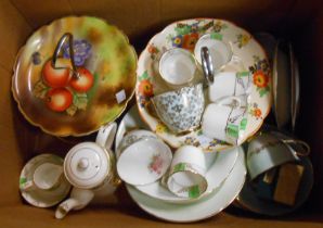 A box containing a quantity of ceramics including teaware, cake plate, etc.