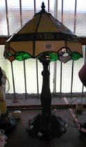 A contemporary Tiffany style lamp coloured glass shade