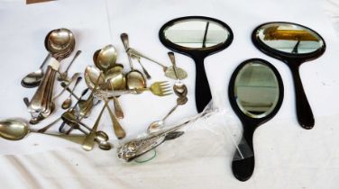 A box containing a small quantity of silver plated cutlery and three vintage hand mirrors - sold