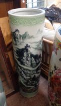 A large 20th Century Chinese porcelain vase of cylindrical form with hand painted landscape