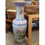 A very large 20th Century Chinese porcelain vase with floral decoration on a white glaze ground