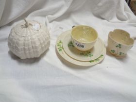 A Belleek porcelain trio of typical form, with moulded basketweave and shamrock decoration with hand