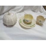 A Belleek porcelain trio of typical form, with moulded basketweave and shamrock decoration with hand