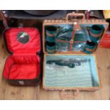 A wicker picnic basket with contents - sold with a vintage Constellation cabin bag