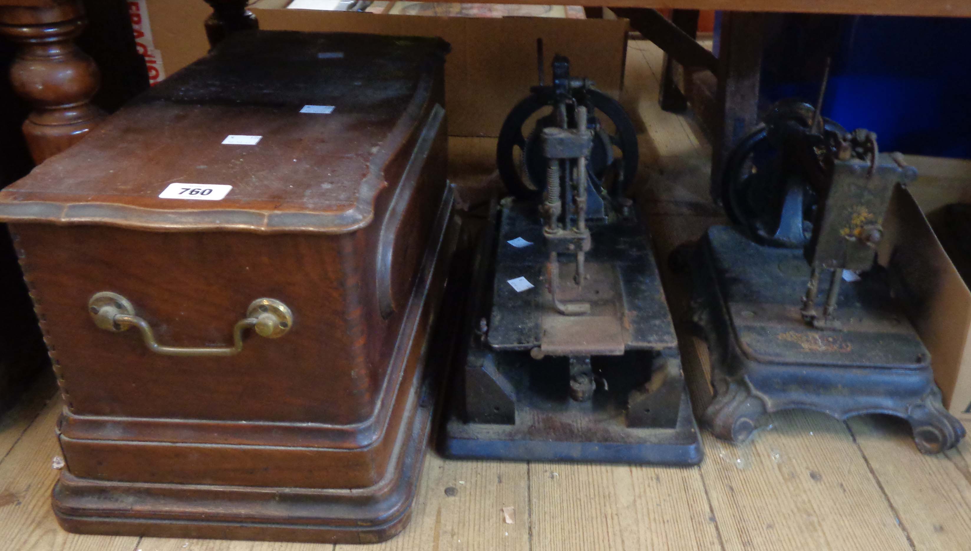 Three antique sewing machines including a Wheller & Wilson, an Atlas 'Polly' and one other in case