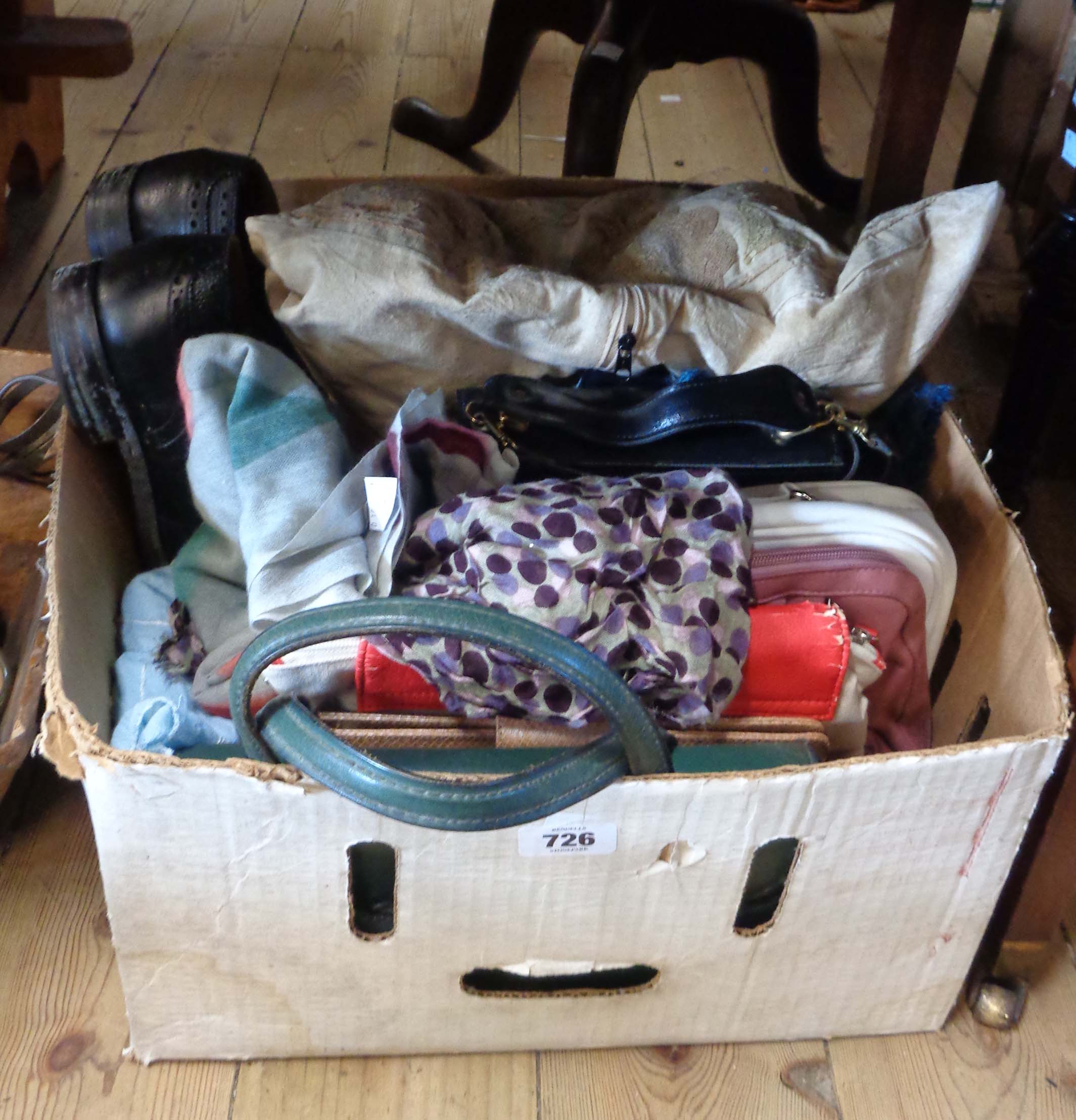 A box containing handbags, shawls, etc.