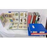 Eleven assorted ring bound albums containing collections of PHQ cards - dating from 1999 to 2017