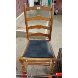 A pine ladder back chair