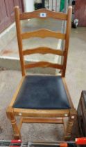 A pine ladder back chair