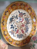 A Zolnay Pecs charger with central Iznik style floral decoration and a frieze border - impressed