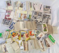 A collection of loose vintage cigarette and tea cards including long format Typhoo, Senior