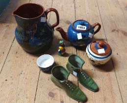 A small quantity of Torquay and other pottery including parrot decorated jug, kingfisher teapot,