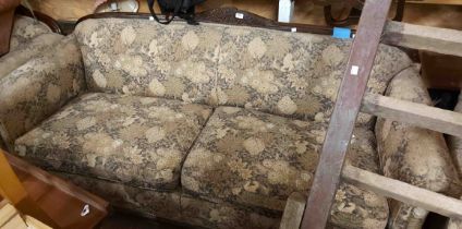 A 1.96m 1920's style carved oak part show frame settee with machine tapestry upholstery