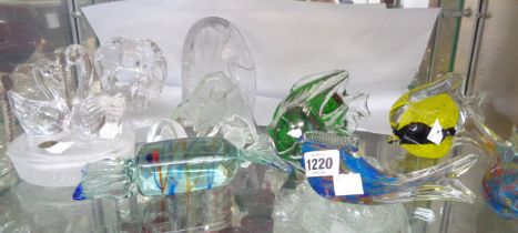 A quantity of assorted glass including fish figurines, paperweights, etc.