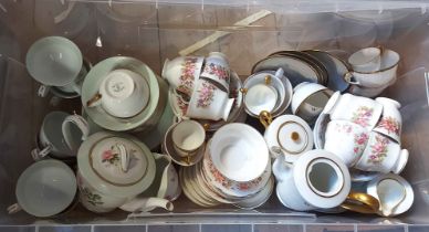 A crate containing a large quantity of bone china teaware including cups and saucers, teapots,