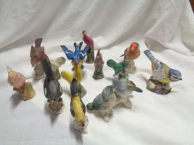 A small quantity of ceramic bird figurines including Royal Worcester Blue Tit, etc.