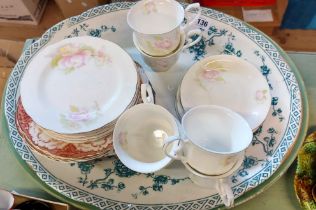 A bone china part tea set - sold with two pottery meat plates
